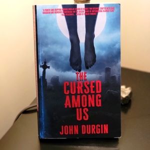 The Cursed Amoung Us book